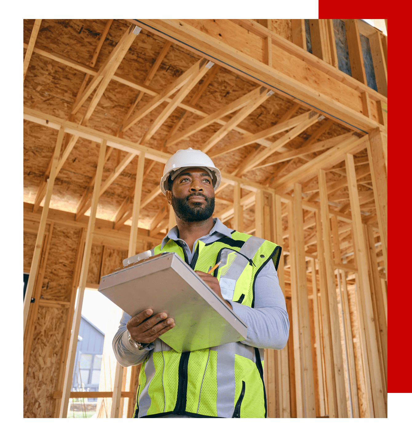 Engineer assessing building framework